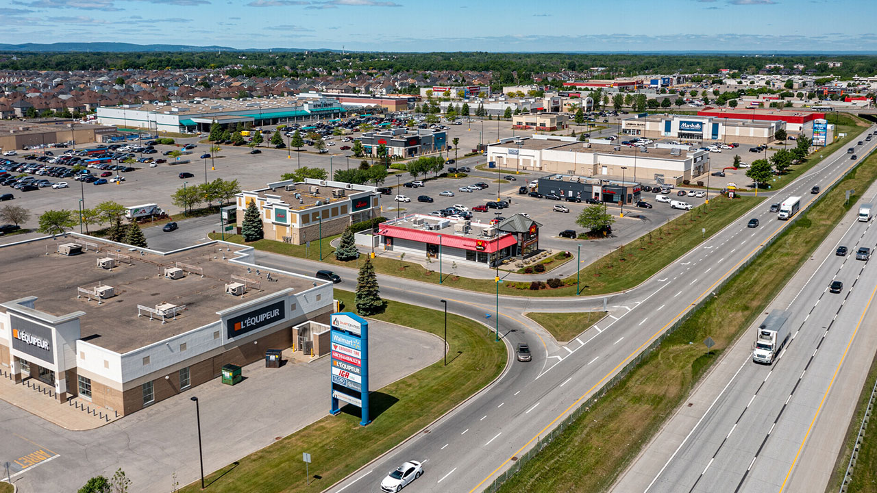 Aerial photo of the SmartCentres Laval West, Walmart-anchored shopping center with available space for lease 