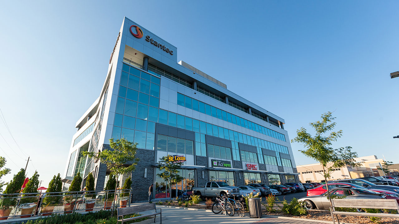 Image of the a leasable business office tower with quick serve restaurants and retail stores at ground level in Ottawa, Ontario
